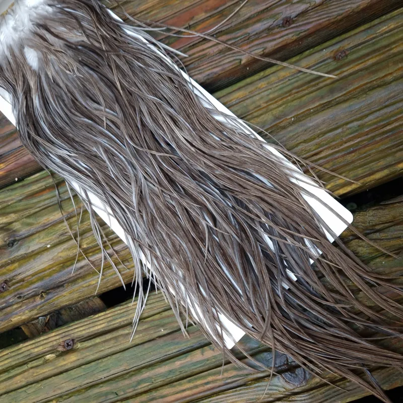 Whiting Heritage Hackles Rooster Saddle in Mixed Colours A Natural Dark Gray Dun/ Dark Blue Dun/ Iron Blue Dun Approx Tying Sizes 10/12/14 with the odd 16-1