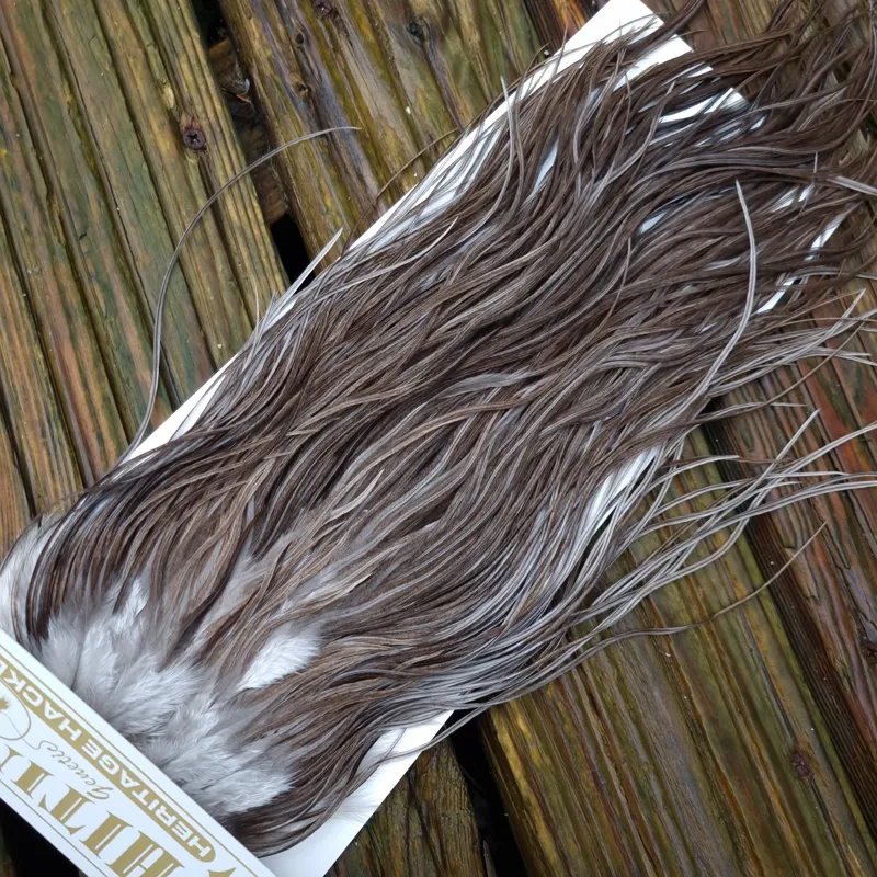 Whiting Heritage Hackles Rooster Saddle in Mixed Colours A Natural Dark Gray Dun/ Dark Blue Dun/ Iron Blue Dun Approx Tying Sizes 10/12/14 with the odd 16-6