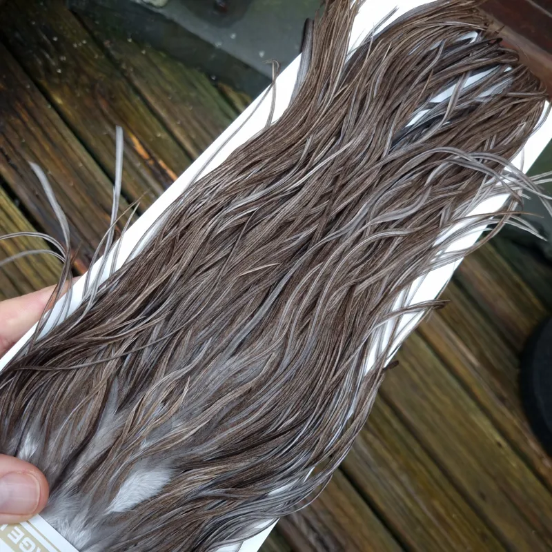 Whiting Heritage Hackles Rooster Saddle in Mixed Colours A Natural Dark Gray Dun/ Dark Blue Dun/ Iron Blue Dun Approx Tying Sizes 10/12/14 with the odd 16-2