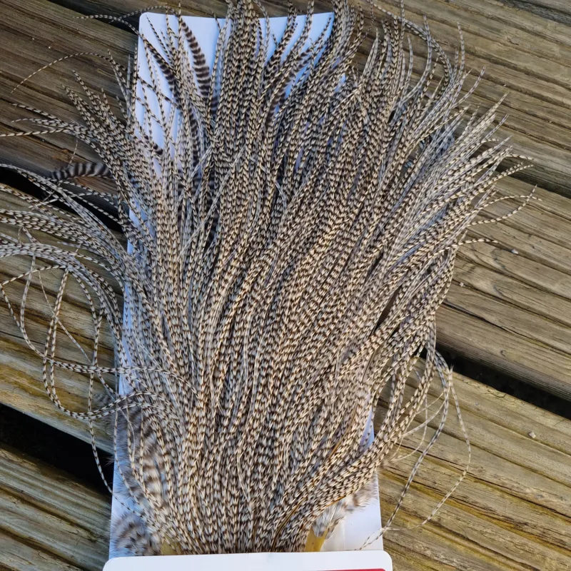 Whiting Pro-Grade Midge Rooster Saddle in Grizzly Variant B Light Grizzly Approx Tying Sizes 14/16/18/20 and a few smaller-1