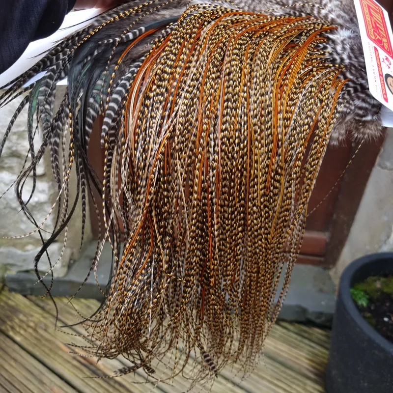 Whiting Bronze Grade Midge Rooster Saddle in CREE B Approx Tying Size Few 14 and Stuffed with16/18 and a few 20 and smaller