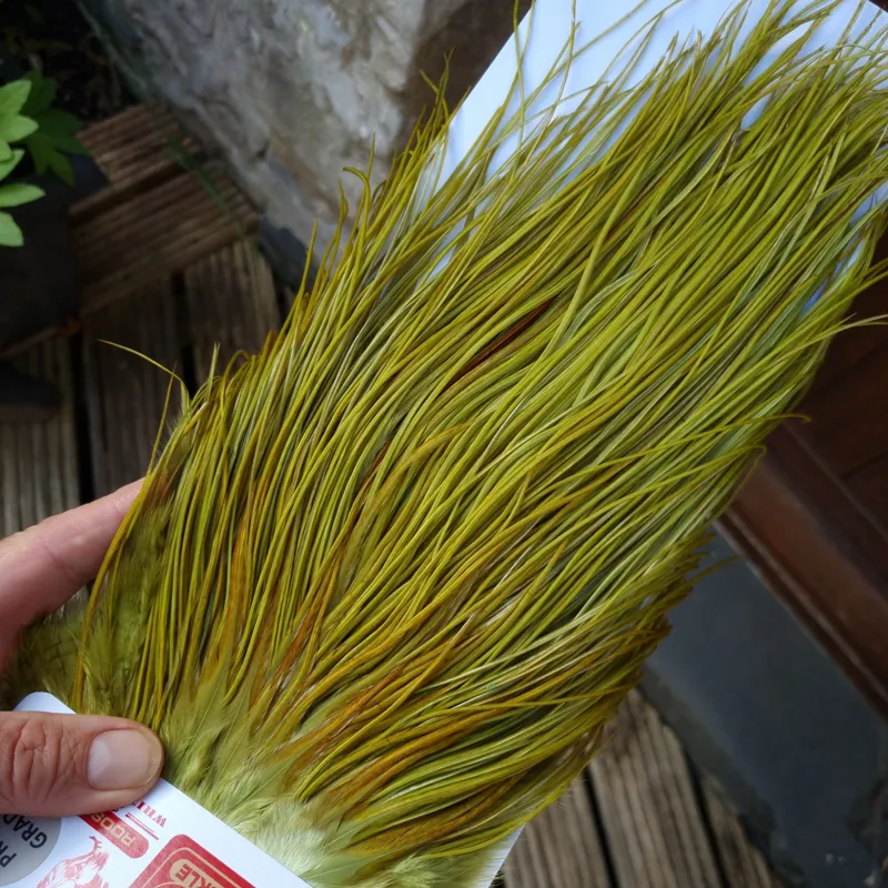 Whiting Pro-Grade Midge Rooster Saddle in White Dyed Olive B Light Olive/ Medium Olive/ Rusty Olive and Yellow Olive Approx Tying Size Few14 and Stuffed with 14/16/18/20/22 and a few smaller-9