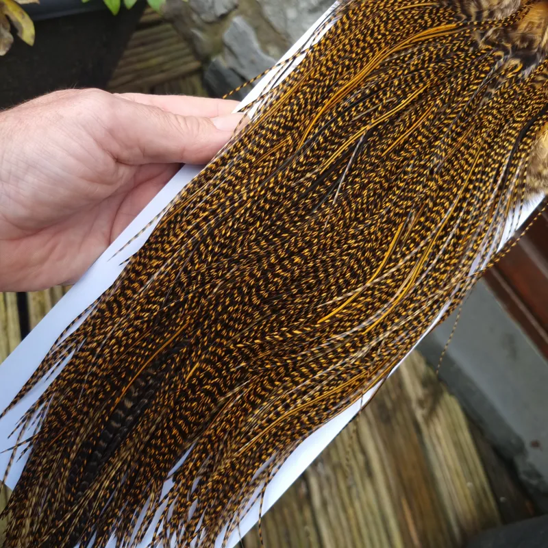 Whiting Pro-Grade Midge Rooster Saddle in Grizzly Dyed March Brown A Grizzly March Brown/ Lightly Splashed with Badger Dyed March Brown Approx Tying Sizes Few 14 and stuffed with 16/18/20/22 /24 and a few going smaller-8