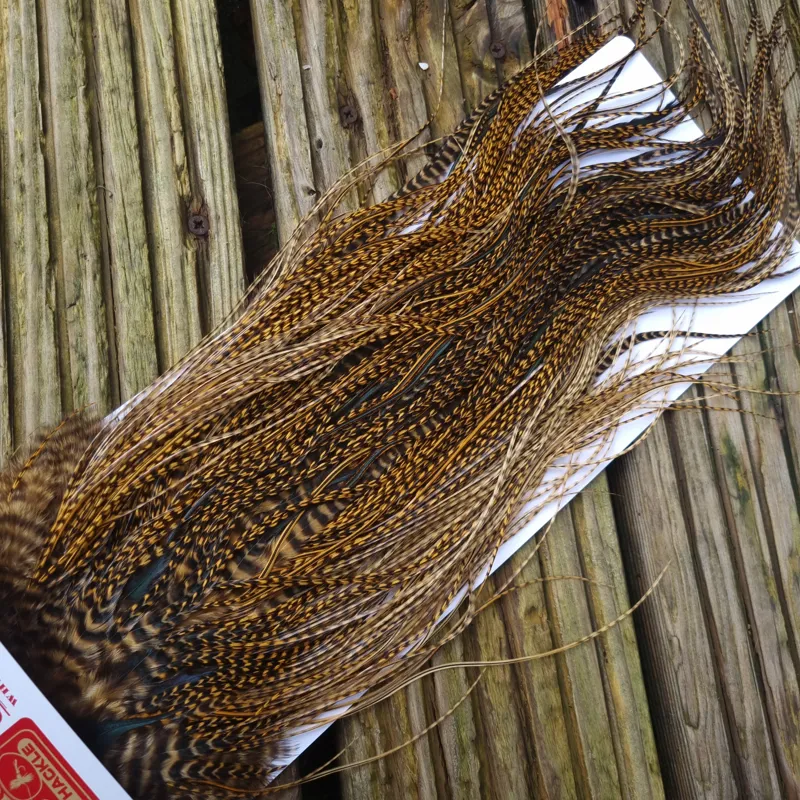Whiting Pro-Grade Midge Rooster Saddle in Grizzly Dyed March Brown B Grizzly March Brown/Splashed with Badger March Brown Approx Tying Sizes  14 16 18 20 22 you might find a few smaller-6