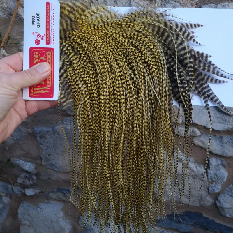 Whiting Pro-Grade Midge Rooster Saddle in Grizzly Dyed Pale Yellow A Approx Tying Size 14 16 18 with a few going smaller