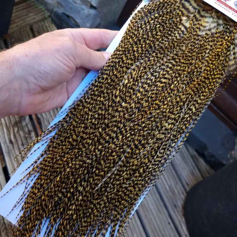Whiting Pro-Grade Midge Rooster Saddle in Grizzly Golden Straw A Approx Tying Sizes Few 12's and stuffed with 14/16 with the odd one going smaller-9