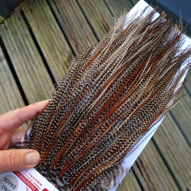 Whiting Pro-Grade Midge Rooster Saddle in Grizzly Variant C Dark Grizzly Lightly Splashed with Furnace Hackles Approx Tying Sizes  Few 14 and stuffed with16/18/20 and a few going smaller-3