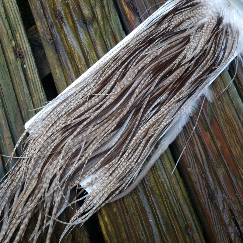 Whiting Heritage Hackles Rooster Saddle in Mixed Colours L Dun Grizzly Splashed with Natural Dun/ Chocolate Brown  Approx Tying Size 12/14/16 and a few 18	-3