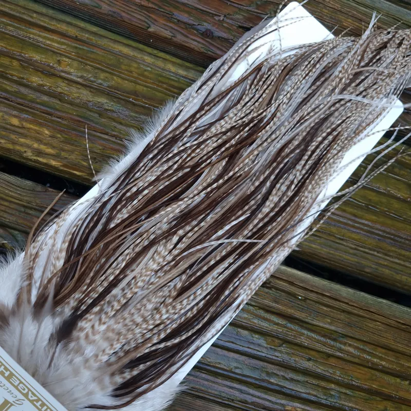 Whiting Heritage Hackles Rooster Saddle in Mixed Colours L Dun Grizzly Splashed with Natural Dun/ Chocolate Brown  Approx Tying Size 12/14/16 and a few 18	-8