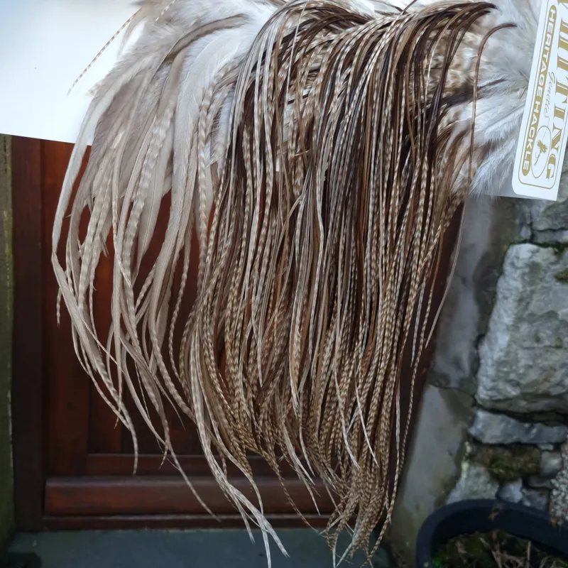 Whiting Heritage Hackles Rooster Saddle in Mixed Colours L Dun Grizzly Splashed with Natural Dun/ Chocolate Brown  Approx Tying Size 12/14/16 and a few 18	-2