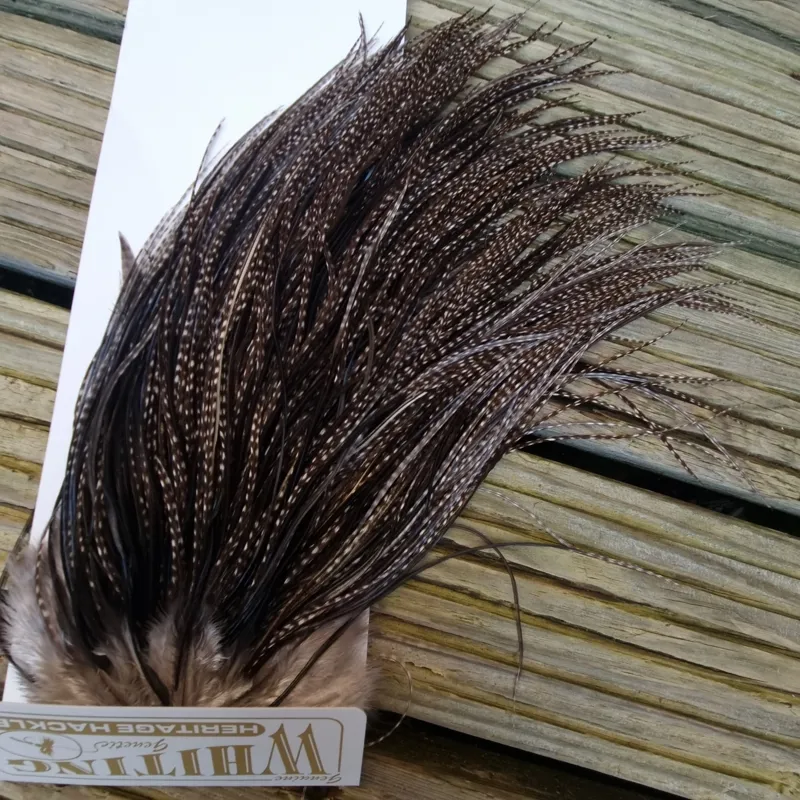 Whiting Heritage Hackles Rooster Saddle in Mixed Colours L Dark Grizzly Variant/ Natural Black Approx Tying Size 12/14 and a few 16	-5