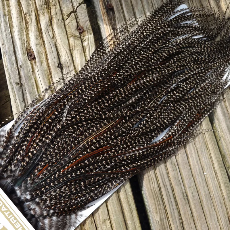 Whiting Heritage Hackles Rooster Saddle in Mixed Colours P Grizzly Variant/Dark Grizzly with a very light Splashing of Natural Black and Furnace  Approx Tying Size 10/12/14-3