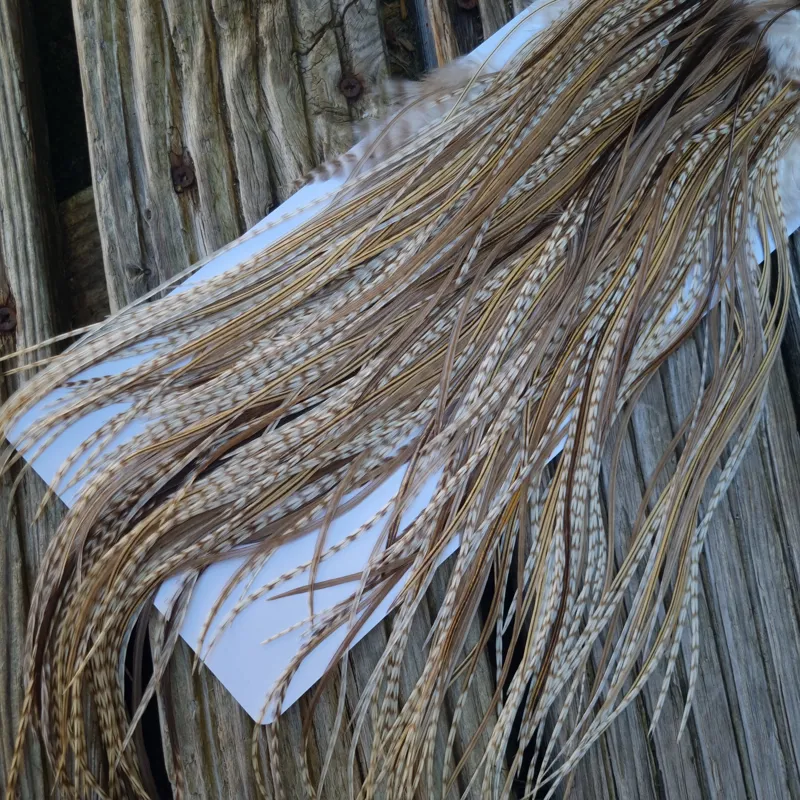 Whiting Heritage Hackles Rooster Saddle in Mixed Colours A Dun Grizzly/Golden Badger/Tan Dun/Brown Dun Tying Approx Tying Sizes 8/10/12 odd 14-4