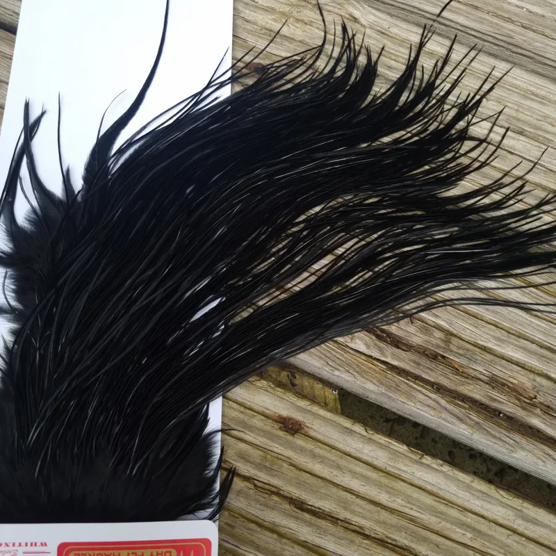 Whiting Pro-Grade Midge Rooster Saddle in Black B Approx Tying Sizes Few 12 and stuffed with 14/16/18/20 with a few going smaller-3