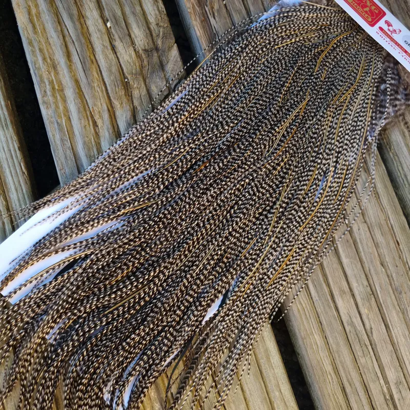 Whiting Pro-Grade Midge Rooster Saddle in Grizzly Variant C Classic Grizzly Lightly Splashed with Golden Badger Hackles Approx Tying Sizes  Few 14/16/18/20 -2