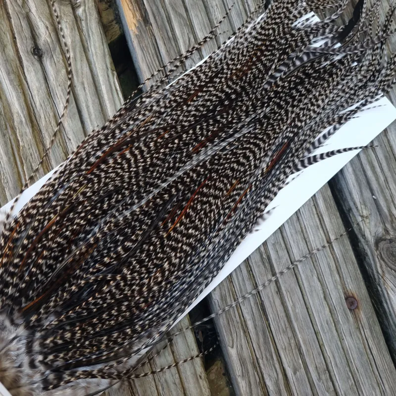 Whiting Heritage Hackles Rooster Saddle in Mixed Colours C Dark Grizzly Lightly Splashed with Natural Black/Furnace Hackles Tying Approx 10/12/14-7