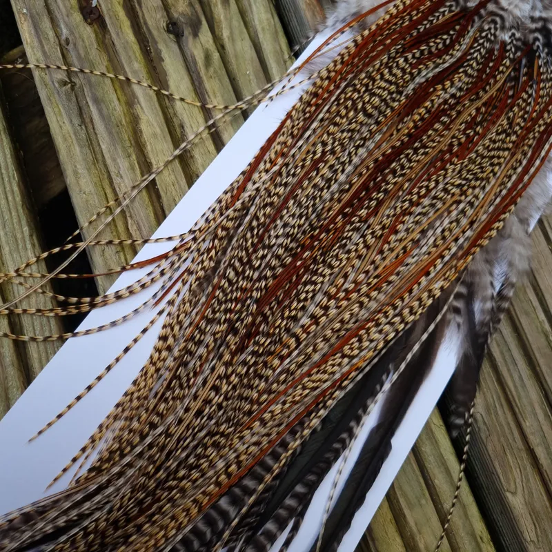 Whiting Pro-Grade Midge Rooster Saddle in Light CREE B Splashed with Furnace Approx Tying Sizes 14/16-5