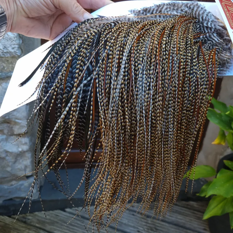 Whiting Bronze Grade Midge Rooster Saddle in CREE A Classic Cree with a light Splashing of Furnace Approx Tying Sizes 14/16/18 you might find a few going smaller