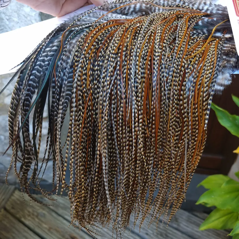Whiting Bronze Grade Midge Rooster Saddle in CREE C Classic Cree Splashed with Furnace and Greenwells hackles Approx Tying Size 14/16/18 some 20s