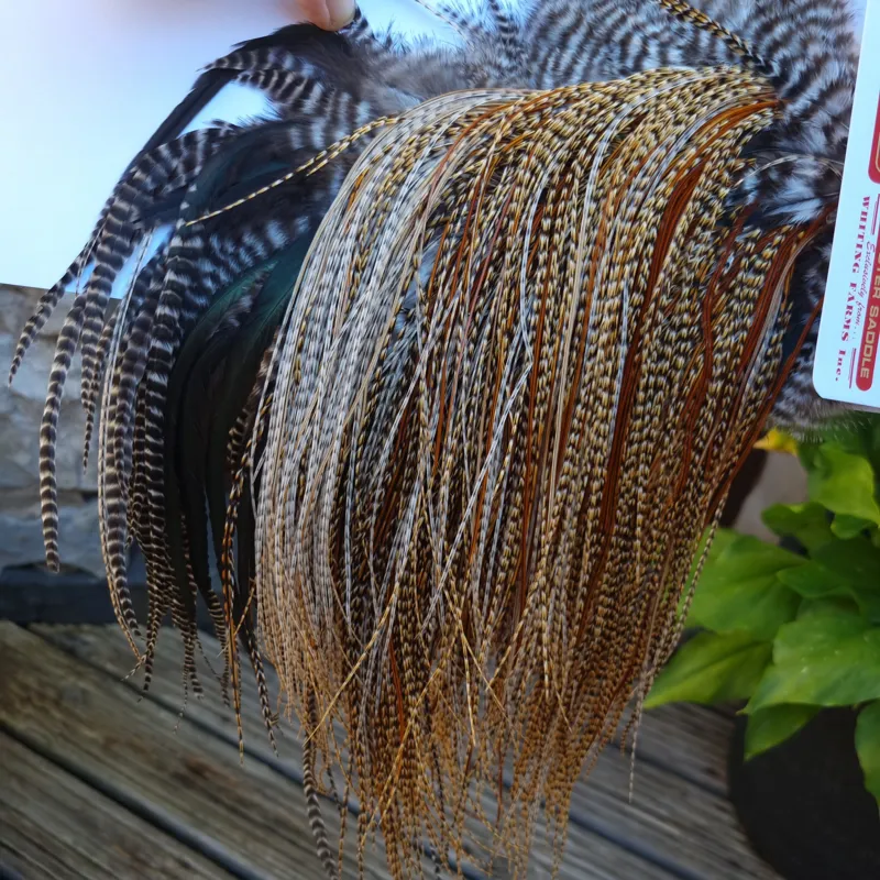 Whiting Bronze Grade Midge Rooster Saddle in CREE D Classic Cree Splashed with Furnace Hackles Approx Tying Size 14/16/18 with a few smaller