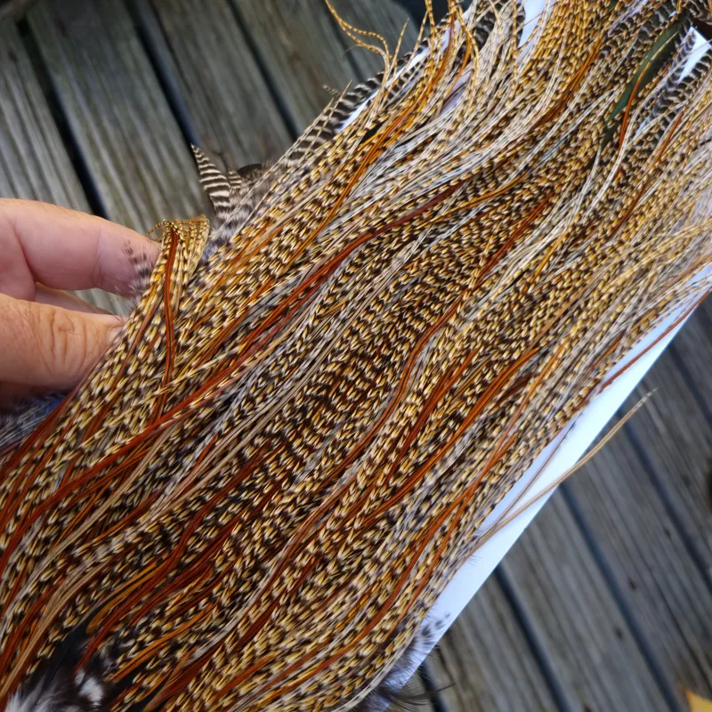 Whiting Bronze Grade Midge Rooster Saddle in CREE D Classic Cree Splashed with Furnace Hackles Approx Tying Size 14/16/18 with a few smaller-9