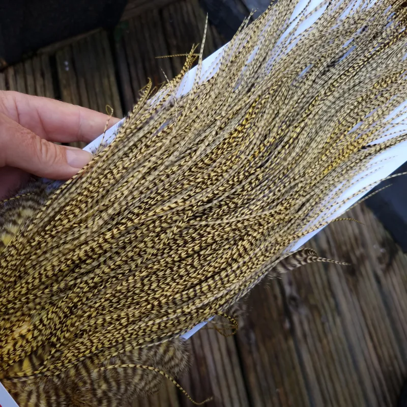 Whiting Pro-Grade Midge Rooster Saddle in Grizzly Dyed Pale Yellow C Approx Tying Size 14/16/18/20/22 some going smaller