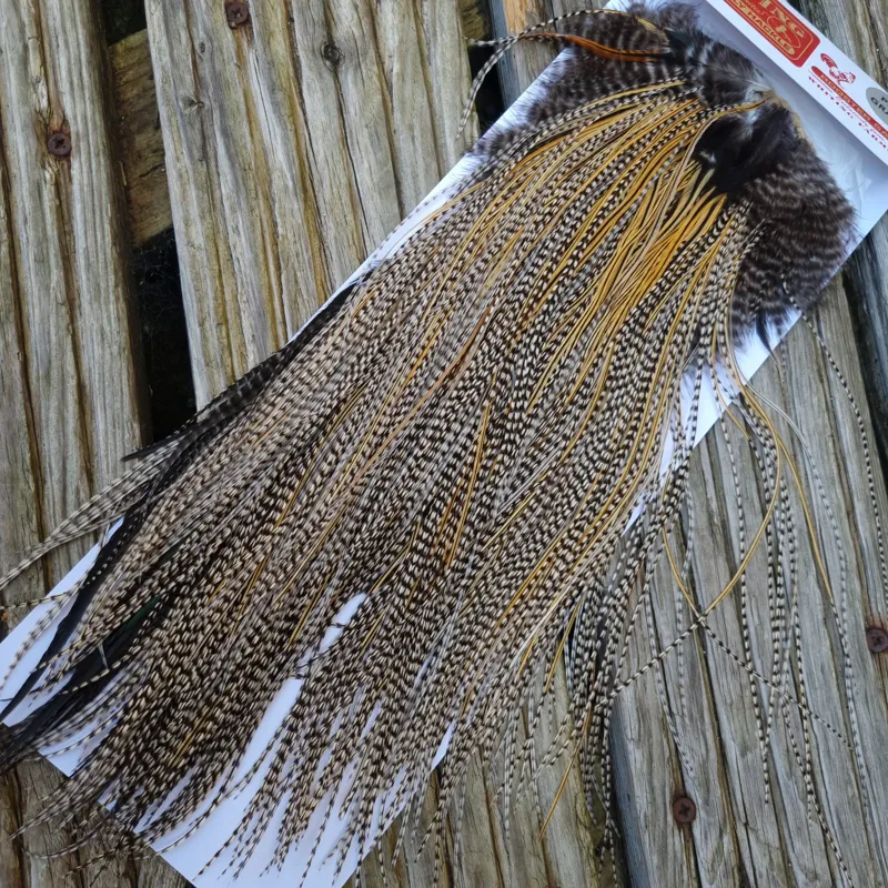 Whiting Pro-Grade Midge Rooster Saddle in Grizzly Variant A in Classic GRIZZLY Splashed with Golden Badger Hackles Approx Tying Sizes  14/16/18/20/22/24