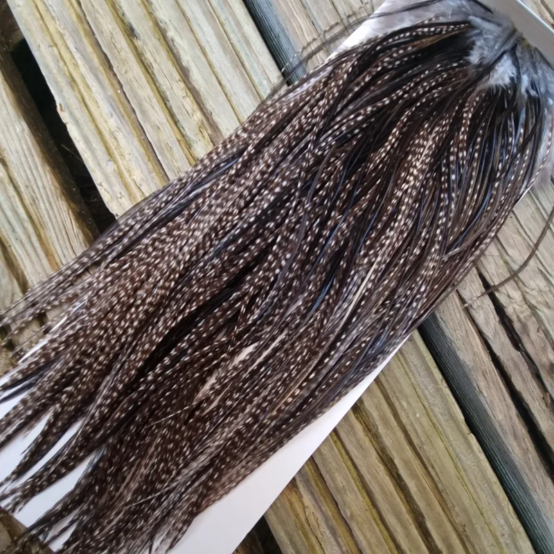 Whiting Heritage Hackles Rooster Saddle in Mixed Colours L Dark Grizzly Variant/ Natural Black Approx Tying Size 12/14 and a few 16	-6