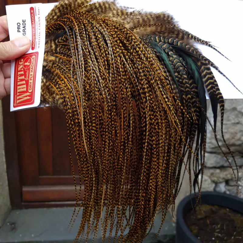 Whiting Pro-Grade Midge Rooster Saddle in Grizzly March Brown/ Splashed with Badger March Brown  A Approx Tying Sizes Some 14 and stuffed with 16/18/20/22 and you will find  a few going smaller-6