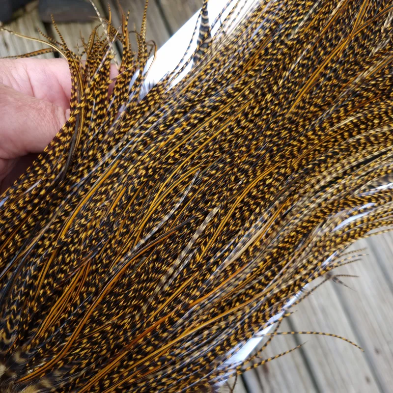 Whiting Pro-Grade Midge Rooster Saddle in Grizzly March Brown/ Splashed with Badger March Brown  A Approx Tying Sizes Some 14 and stuffed with 16/18/20/22 and you will find  a few going smaller-1