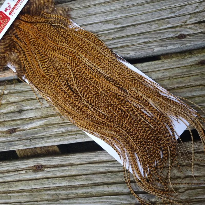 Whiting Pro-Grade Midge Rooster Saddle in Grizzly Dyed March Brown B Grizzly March Brown/Splashed with Badger March Brown Approx Tying Sizes  14 16 18 20 you might find a few smaller-5