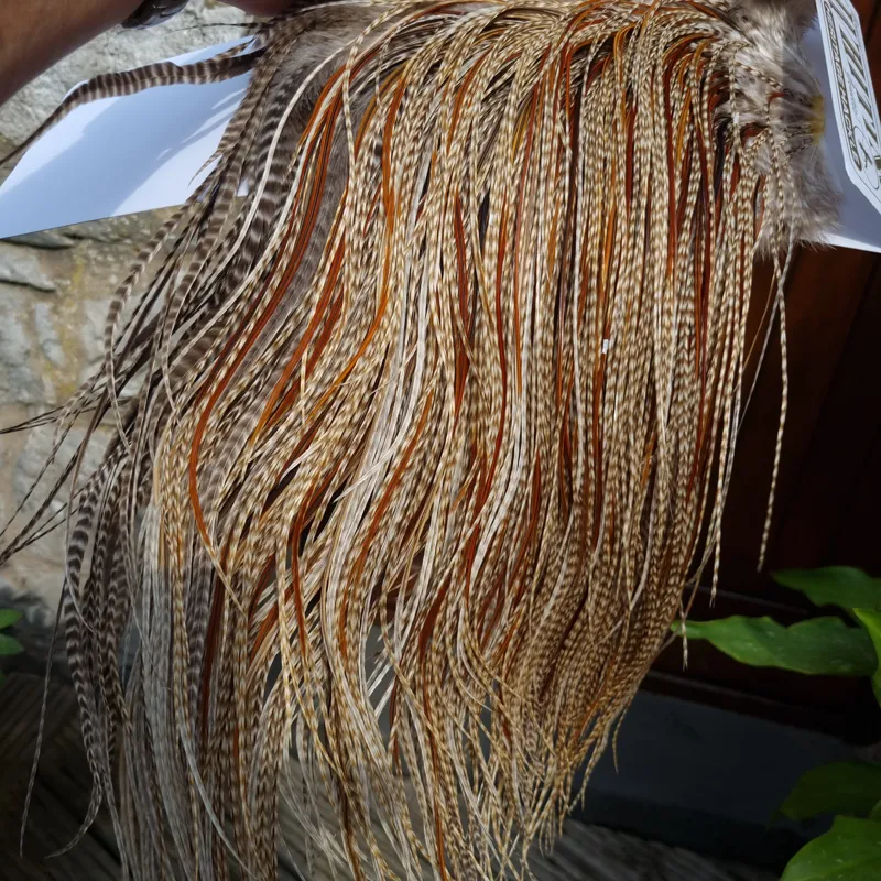 Whiting Heritage Hackles Rooster Saddle in Mixed Colours N Dun Grizzly with a Splashing of Furnace/Rusty Dun Hackles Approx .Tying Size 10/12/14 with a few 16/18