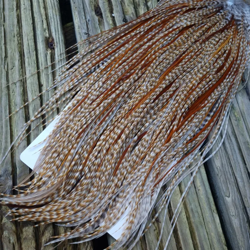 Whiting Heritage Hackles Rooster Saddle in Mixed Colours N DUN CREE and Splashed with Red Game/Rusty Dun Approx .Tying Size 10/12/14 with the odd 16-6