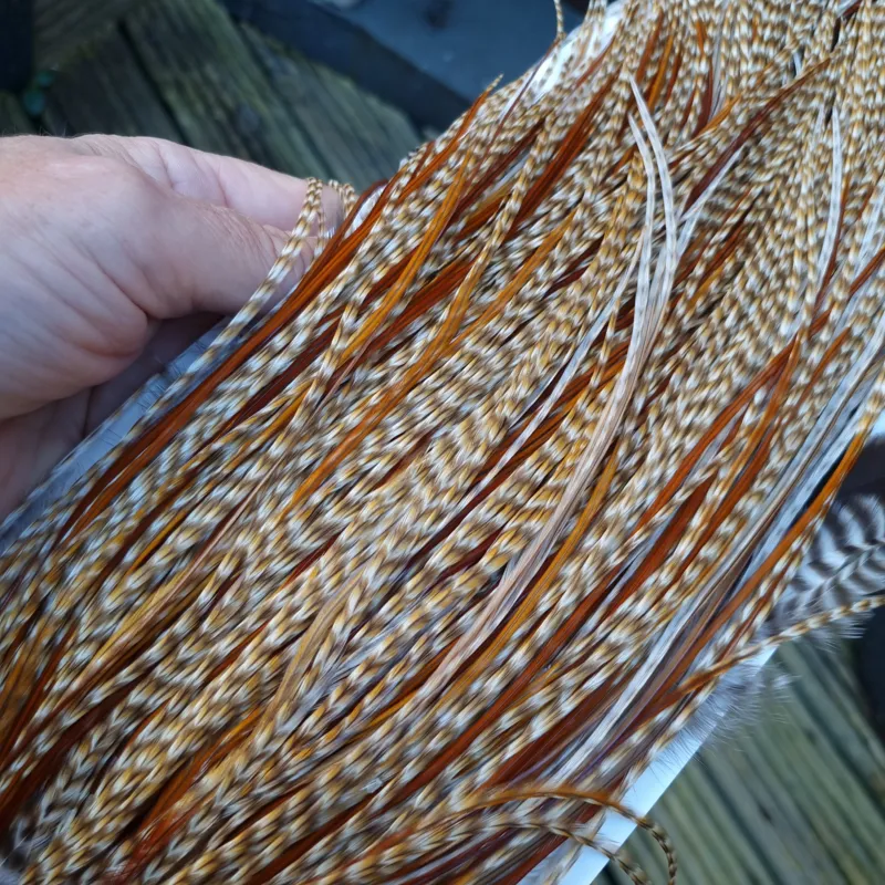Whiting Heritage Hackles Rooster Saddle in Mixed Colours N DUN CREE and Splashed with Red Game/Rusty Dun Approx .Tying Size 10/12/14 with the odd 16-10