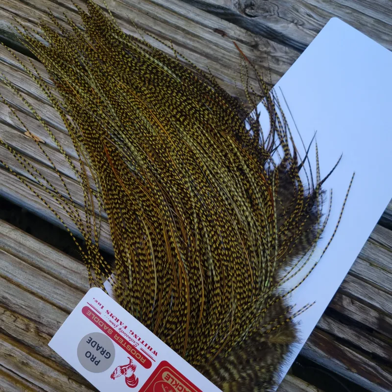 Whiting Pro-Grade Midge Rooster Saddle in Grizzly dyed Olive and Splashed with OLIVE Badger A Approx. tying sizes  16 18 20 22 24 and out of sight-6