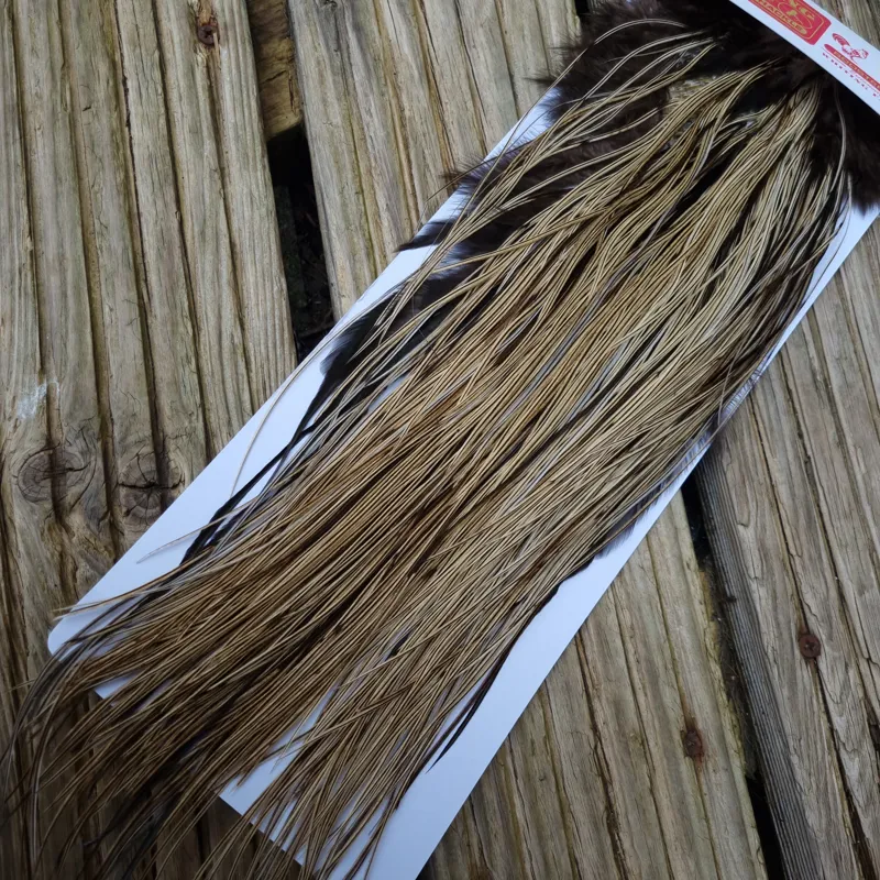 Whiting Pro-Grade Midge Rooster Saddle in Silver Badger/Speckled Silver Badger  A Tying approx  a few 12 and stuffed with14 16 18 20 22 you might find a few smaller-3