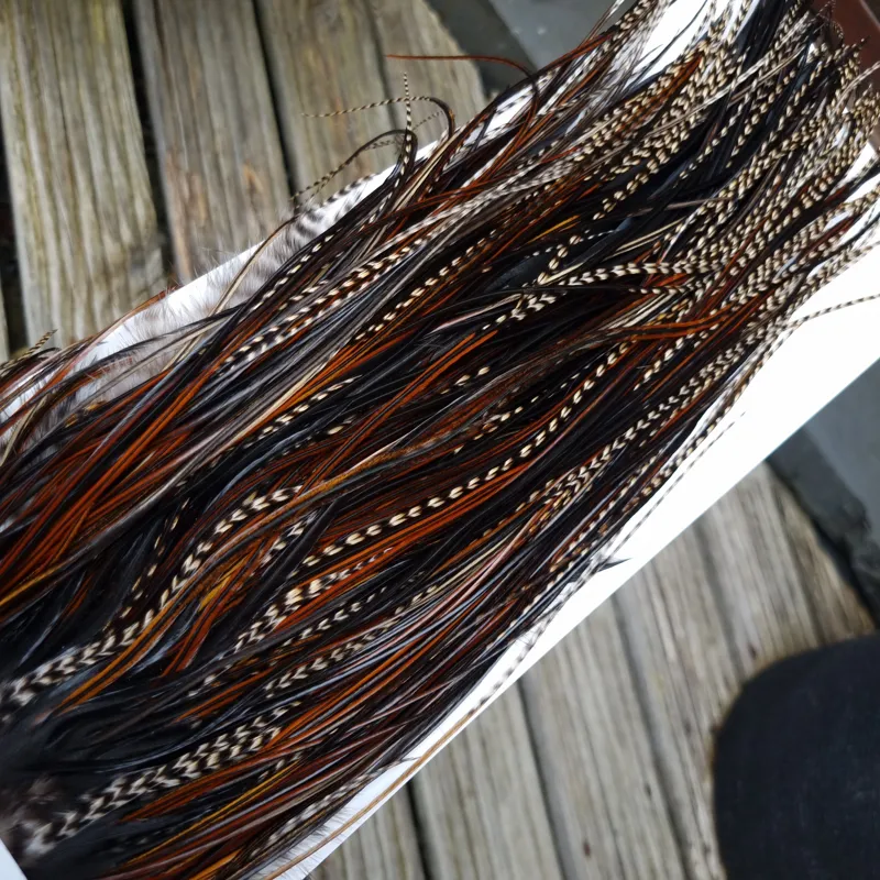 Whiting Heritage Hackles Rooster Saddle in Mixed Colours V Grizzly/Furnace/Natural Black/Speckled Furnace  Approx Tying size 10/12/14